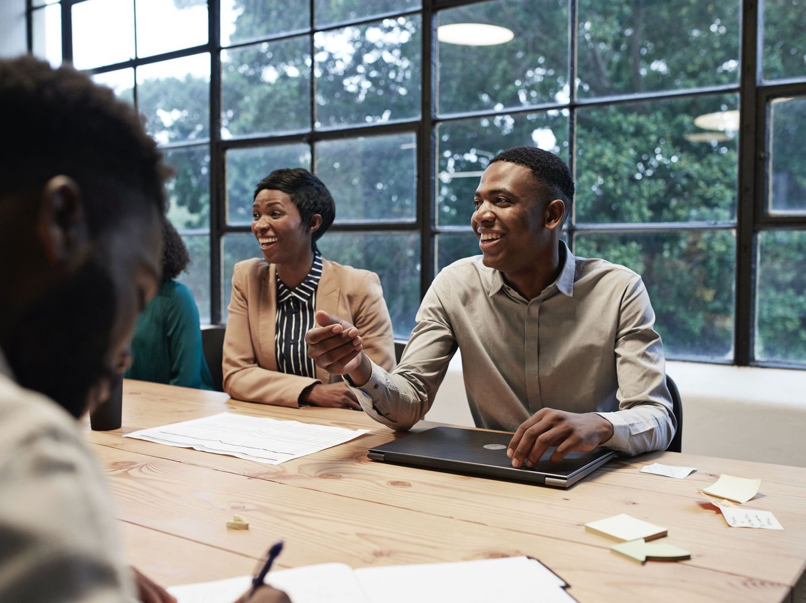 Real estate team collaborating in a modern office